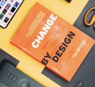 the design of a book cover with a yellow background with the title 'change by design' written by tim brown